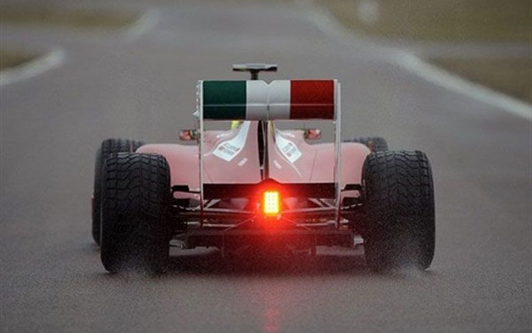Італія, Маранелло. Новий болід Формули 1 Ferrari F150 під час випробувань на стадіоні Маранелло. / © AFP