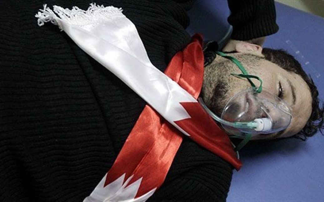 Опозиція у Бахрейні стверджує, що в результаті дій поліції загинули не менше двох осіб, десятки госпіталізовані з тілесними ушкодженнями і отруєнням газом. / © AFP