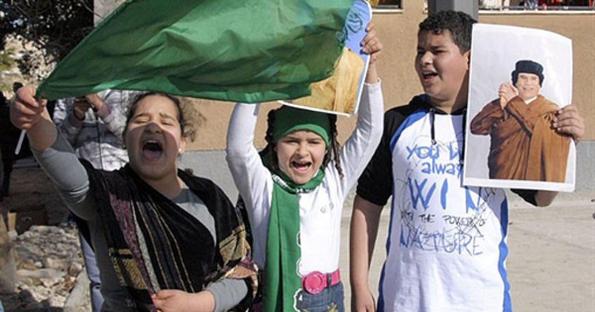 Прихильники Каддафі зустріли його бурхливими оваціями і скандуванням на його підтримку. / © AFP