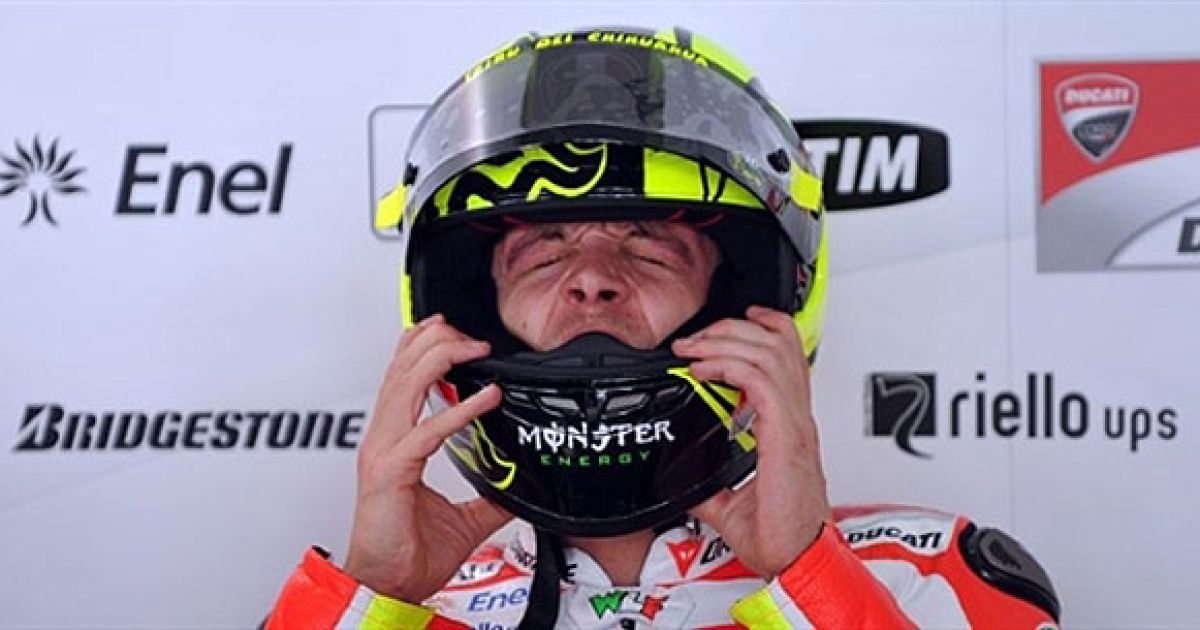 Малайзія, Сепанг. Італійський мотогонщик Валентино Россі з команди Ducati готується до початку нового сезону MotoGP перед на треку Сепанг поблизу Куала-Лумпура. / © AFP