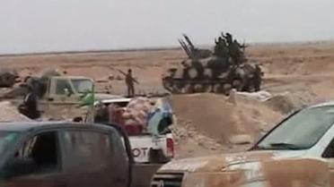 Армия Каддафи приближается к городу Бенгази