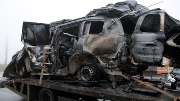 Пошкоджене авто спостерігачів ОБСЄ, яке наїхало на міну_4 / © Reuters