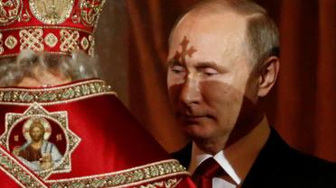 Президент РФ Володимир Путін у храмі Христа Спасителя, Москва / © Reuters