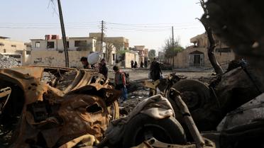 Мирные жители покидают город, пока продолжается противостояние сил Ирака и "ИГ" в Западном Мосуле / © Reuters