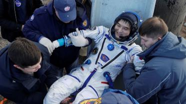 Команда складалася з російського космонавта Анатолія Іванишина, астронавта зі США Кейт Рубінс та їхнього японського колеги Такуї Оніші. / © Reuters