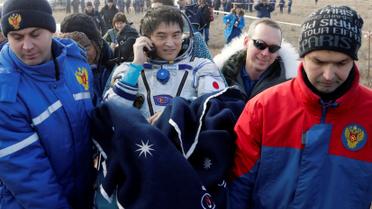 Команда складалася з російського космонавта Анатолія Іванишина, астронавта зі США Кейт Рубінс та їхнього японського колеги Такуї Оніші. / © Reuters