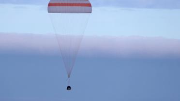 Команда складалася з російського космонавта Анатолія Іванишина, астронавта зі США Кейт Рубінс та їхнього японського колеги Такуї Оніші. / © Reuters