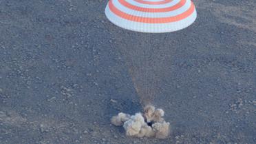 Команда складалася з російського космонавта Анатолія Іванишина, астронавта зі США Кейт Рубінс та їхнього японського колеги Такуї Оніші. / © Reuters