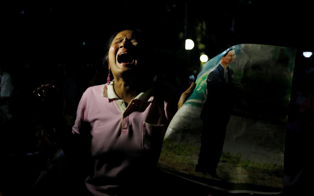 Женщина плачет после объявления о смерти короля Таиланда Пумипона Адульядета. / © Reuters
