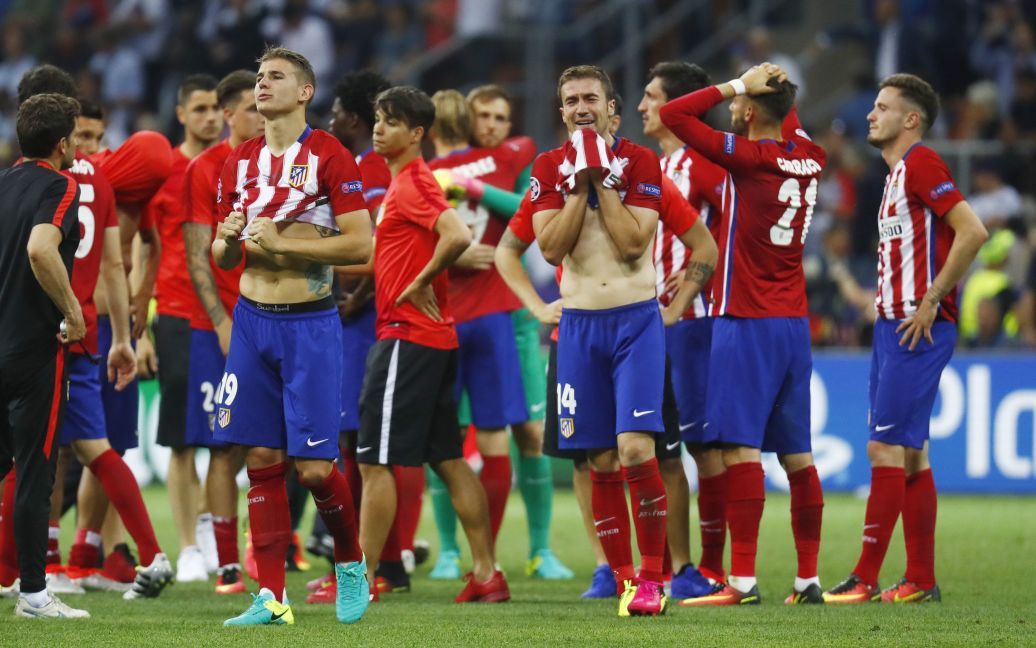 Лігу чемпіонів-2015/16 виграв "Реал". Розпач гравців "Атлетіко" / © Reuters