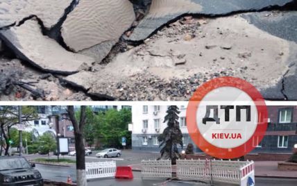После ливней в центре Киева ушел под землю огромный кусок асфальта