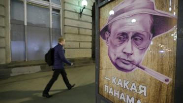 Плакат с Путиным на остановке в Москве / © Reuters