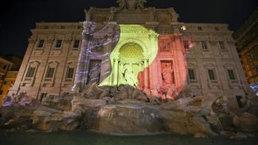 Фонтан Треви в Риме светится цветами бельгийского флага. / © Reuters