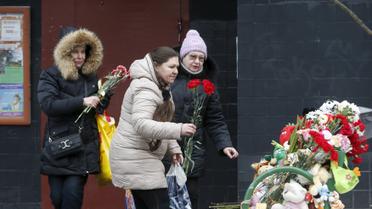 У Москві несуть квіти в пам'ять про вбиту дівчинку_6 / © Reuters