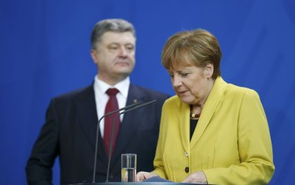 Давление на РФ и освобождение заложников. Порошенко обсудил с Меркель ситуацию на Донбассе