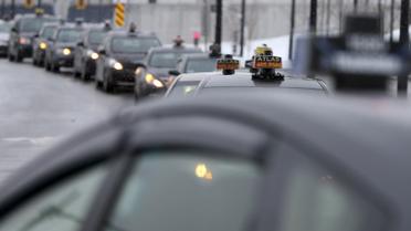 Протест таксистів у Монреалі. / © Reuters