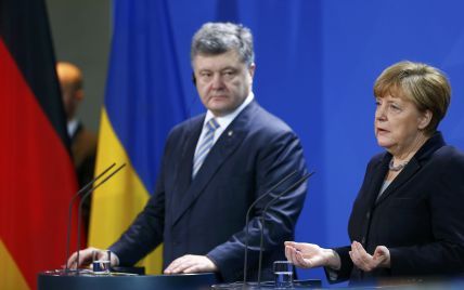 Меркель на встрече с Порошенко: Это не то, о чем мы договаривались в Минске