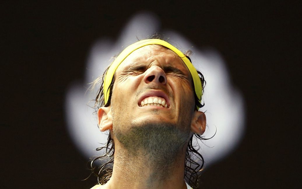 Эмоции испанского теннисиста Рафаэля Надаля во время его первого матча на теннисном турнире Australian Open в Мельбурне. / © Reuters