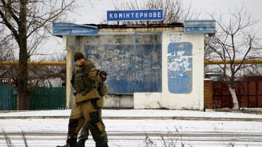 Боевики в захваченном поселке. / © Reuters