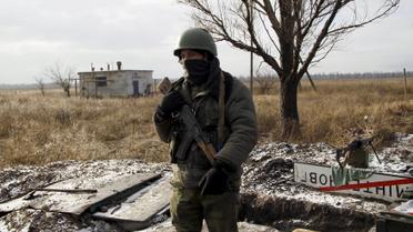 Боевики в захваченном поселке. / © Reuters