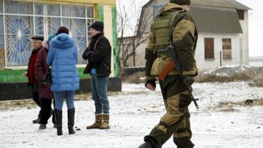 Боевики в захваченном поселке. / © Reuters