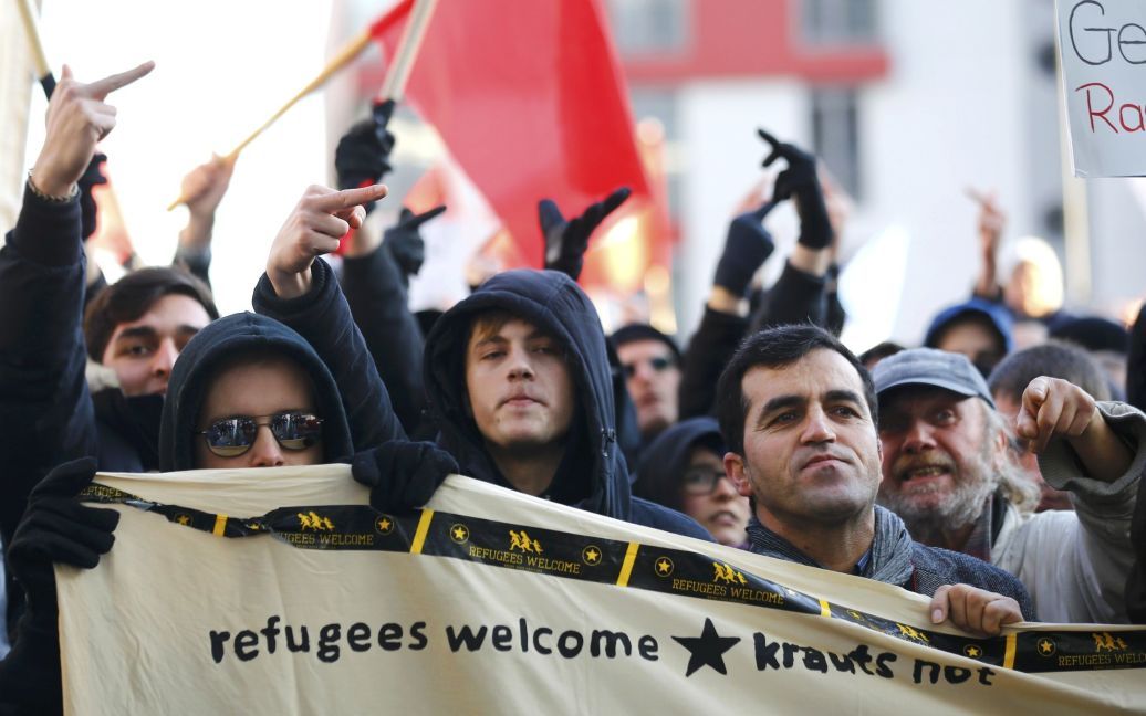 В Кельне сошлись противники и сторонники мигрантов / © Reuters