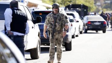 В результате стрельбы со стороны неизвестных погибли по меньшей мере 14 человек. / © Reuters