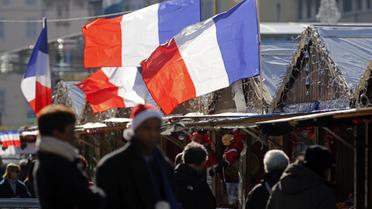 По всьому Парижу майорять прапори Франції. / © Reuters