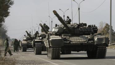 Бойовики ЛНР відводять танки_4 / © Reuters