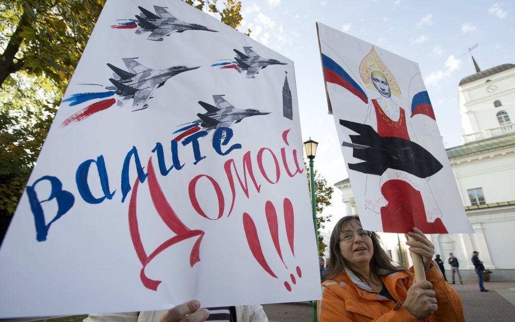 В Минске прошел митинг против российской авиабазы. / © Reuters