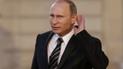 Российский президент Владимир Путин слушает вопрос, когда идет после встречи "нормандской четверки" в Париже. Лидеры Украины, России, Франции и Германии 2 октября обсуждали пути решения конфликта на востоке Украины.