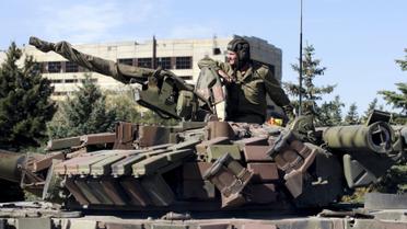 Луганские боевики начали отводить танки от линии соприкосновения. / © Reuters
