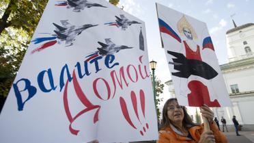 У Мінську пройшов мітинг проти російської авіабази. / © Reuters