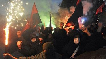 Під час проходження колони близько 100 бійців спецпідрозділу "Беркут" перекривали прилеглі до вул. Володимирської вулиці, щоб унеможливити рух учасників акції в напрямку Хрещатика. / © AFP
