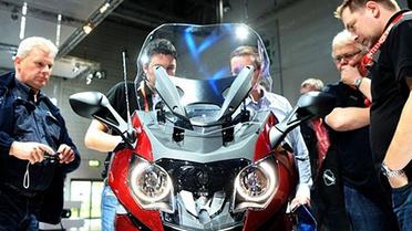 Найбільша у світі мотовиставка Intermot, яка проходить у Кельні (Німеччина), цього року зібрала більше тисячі фірм з 40 країн, які представляють мотоцикли, квадроцикли, трайки, скутери тощо. / © AFP